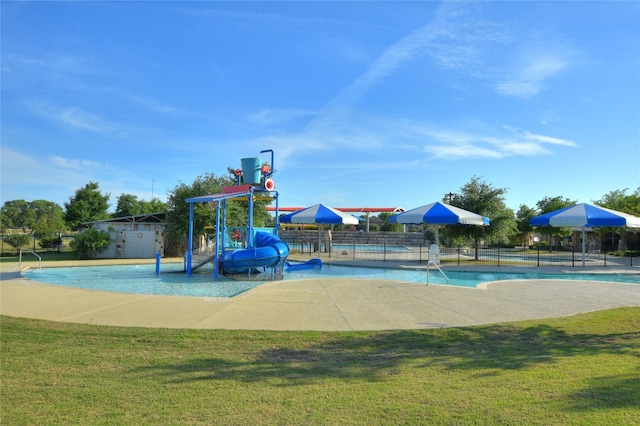 1812 Buffalo Thunder, Leander, TX 78641 - view of play area featuring a water play area and a community pool