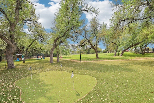 surrounding community featuring a yard