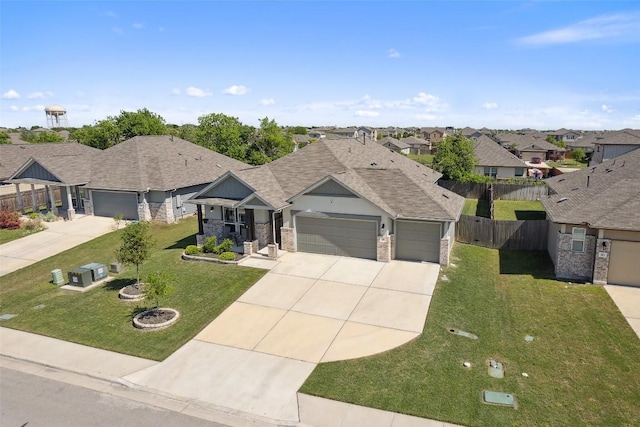 319 Silver Glen Dr, Kyle, TX 78640 - single story home featuring a garage, concrete driveway, a residential view, roof with shingles, and brick siding