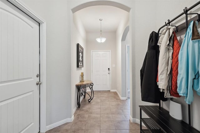 319 Silver Glen Dr, Kyle, TX 78640 - foyer featuring arched walkways and light tile patterned flooring