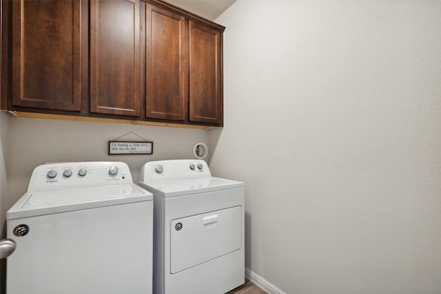 319 Silver Glen Dr, Kyle, TX 78640 - laundry area featuring washing machine and dryer and cabinet space