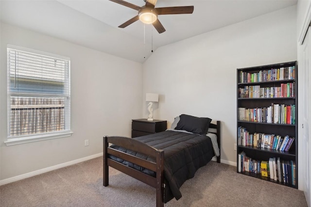 319 Silver Glen Dr, Kyle, TX 78640 - carpeted bedroom with vaulted ceiling and a ceiling fan