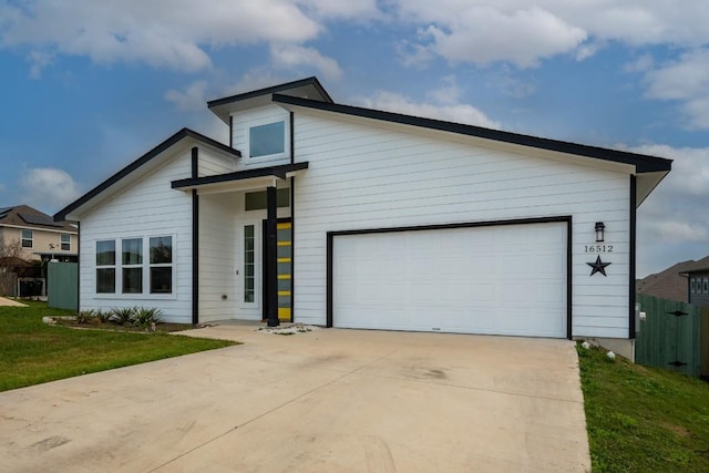 16512 Fetching Ave, Manor, TX 78653 - view of front of property with driveway and an attached garage