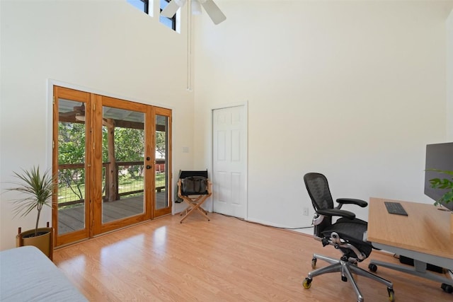 1005 Lisa Dr, Austin, TX 78733 - office space with plenty of natural light, wood finished floors, ceiling fan, a towering ceiling, and french doors
