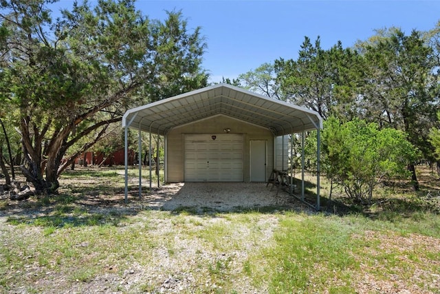 1005 Lisa Dr, Austin, TX 78733 - view of vehicle parking with a garage