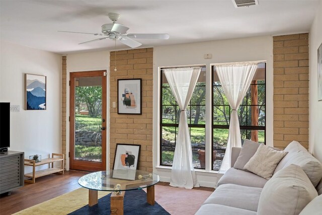 1005 Lisa Dr, Austin, TX 78733 - living room featuring a ceiling fan and wood finished floors