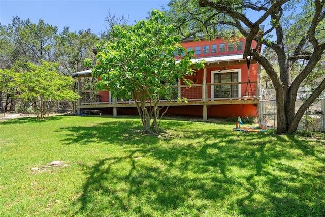 1005 Lisa Dr, Austin, TX 78733 - back of house with a lawn and a deck