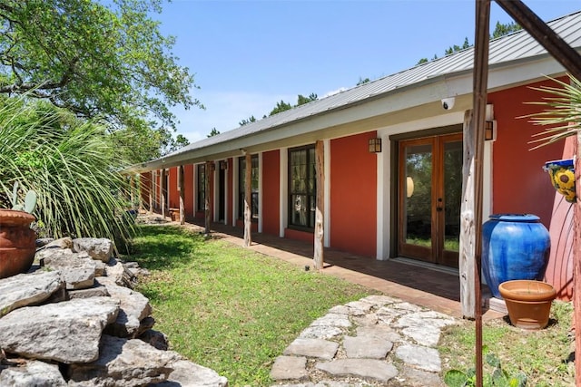 1005 Lisa Dr, Austin, TX 78733 - view of green lawn featuring french doors