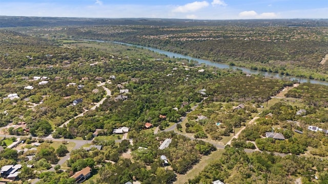 1005 Lisa Dr, Austin, TX 78733 - aerial overview of property's location with a large body of water and a heavily wooded area
