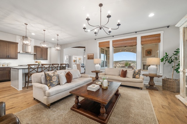 16319 Golden Top Dr, Austin, TX 78738 - living room featuring a chandelier, light wood-type flooring, and recessed lighting