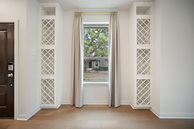 2500 Forest Creek Dr Unit 2501, Round Rock, TX 78665 - entryway featuring wood finished floors and baseboards