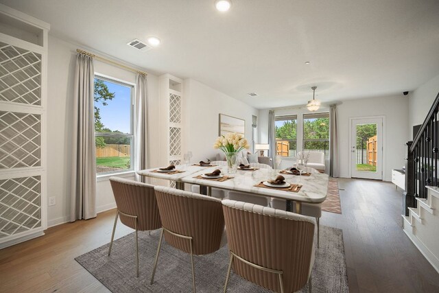 2500 Forest Creek Dr Unit 2501, Round Rock, TX 78665 - dining area featuring light wood finished floors, recessed lighting, stairway, ceiling fan, and visible vents