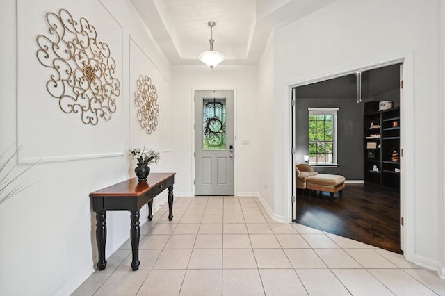 650 Ledge Stone Dr, Austin, TX 78737 - foyer featuring light tile patterned floors and baseboards