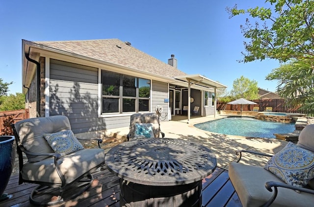 650 Ledge Stone Dr, Austin, TX 78737 - view of pool featuring a fenced backyard, a deck, and a pool with connected hot tub