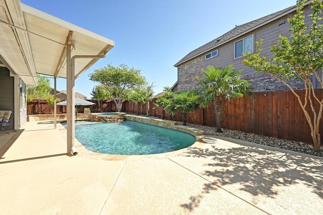 650 Ledge Stone Dr, Austin, TX 78737 - view of pool with a patio, a fenced backyard, and a pool with connected hot tub