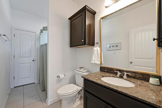 650 Ledge Stone Dr, Austin, TX 78737 - full bathroom with tile patterned floors, vanity, baseboards, and toilet