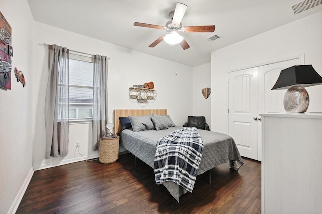 650 Ledge Stone Dr, Austin, TX 78737 - bedroom featuring wood finished floors, baseboards, ceiling fan, and a closet