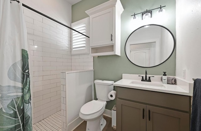 full bath with walk in shower, vanity, and toilet