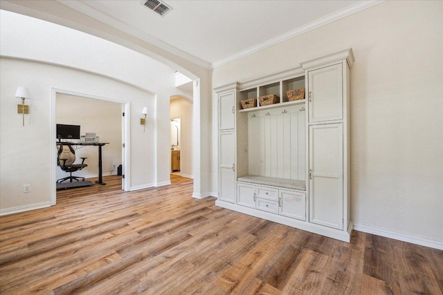 12907 Gordons Hvn, San Antonio, TX 78253 - mudroom featuring crown molding, arched walkways, and light wood-style floors