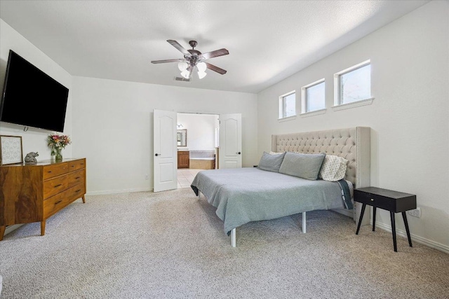 12907 Gordons Hvn, San Antonio, TX 78253 - bedroom with light colored carpet, ensuite bathroom, and ceiling fan
