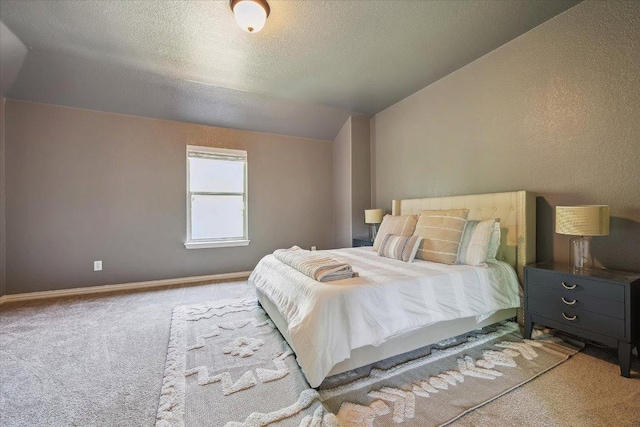 12907 Gordons Hvn, San Antonio, TX 78253 - bedroom featuring carpet flooring, vaulted ceiling, and a textured ceiling