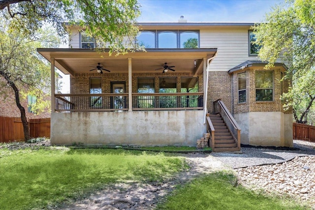 12907 Gordons Hvn, San Antonio, TX 78253 - rear view of house with ceiling fan, brick siding, and stairs