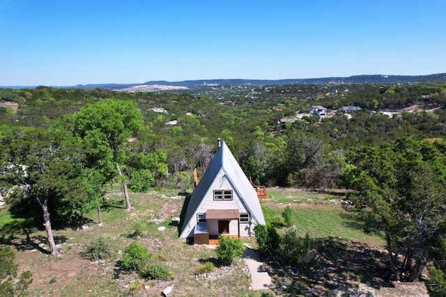 aerial view with a wooded view