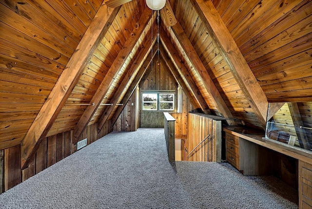 attic featuring an upstairs landing