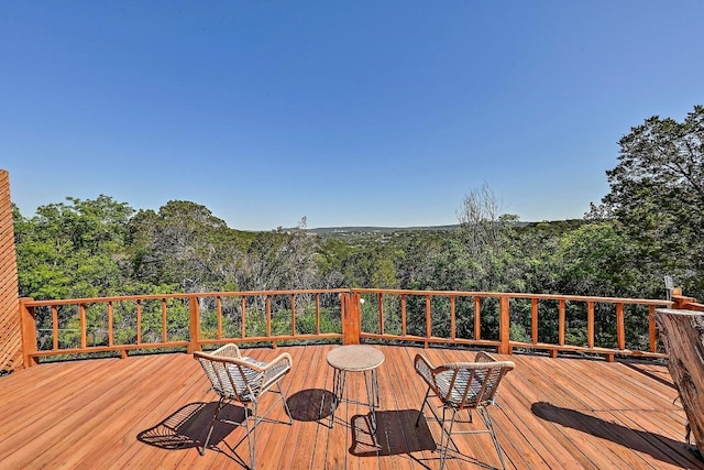 deck with a forest view