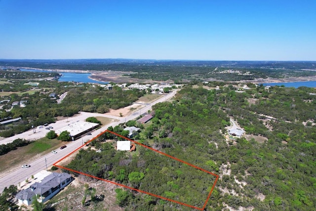 20802 Dawn Dr, Lago Vista, TX 78645 - aerial overview of property's location featuring a large body of water and property parcel outlined