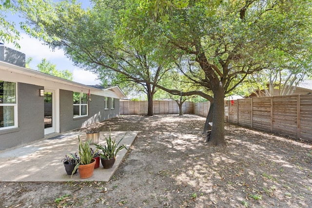 8604 Primrose Ln, Austin, TX 78757 - fenced backyard with a patio area