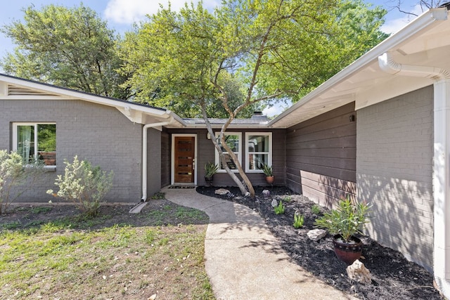 8604 Primrose Ln, Austin, TX 78757 - entrance to property with brick siding