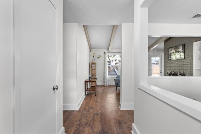 8604 Primrose Ln, Austin, TX 78757 - hallway featuring dark wood-type flooring and beam ceiling