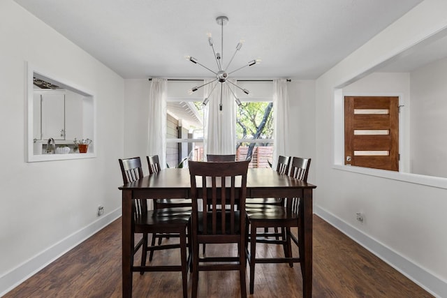 8604 Primrose Ln, Austin, TX 78757 - dining area with a chandelier and wood finished floors