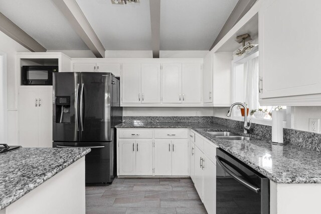 8604 Primrose Ln, Austin, TX 78757 - kitchen featuring stainless steel refrigerator with ice dispenser, dishwasher, black microwave, beamed ceiling, and white cabinets