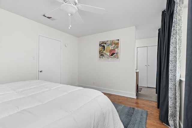 8604 Primrose Ln, Austin, TX 78757 - bedroom with wood finished floors and a ceiling fan