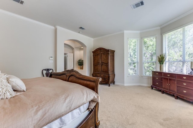 402 Palos Verdes Dr, Lakeway, TX 78734 - bedroom featuring arched walkways, light colored carpet, and crown molding