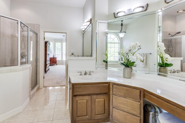 402 Palos Verdes Dr, Lakeway, TX 78734 - full bathroom with a shower stall, tile patterned flooring, and vanity