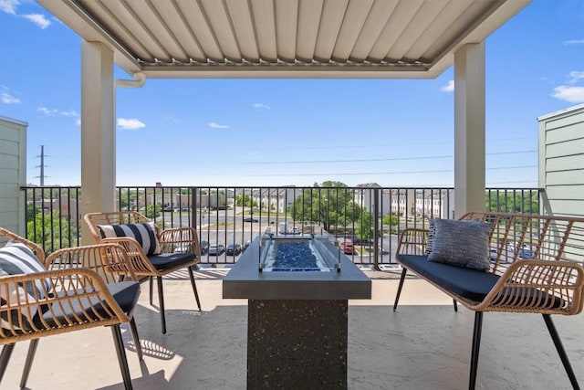 1025 Highknoll Ln, Georgetown, TX 78628 - view of patio / terrace with an outdoor fire pit and a balcony