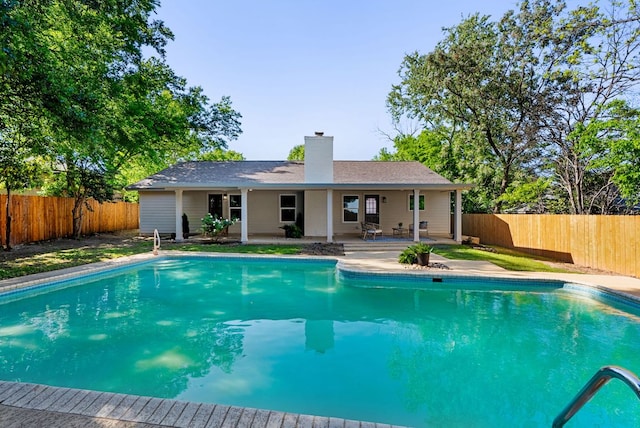 9005 Quail Creek Dr, Austin, TX 78758 - view of swimming pool with a fenced backyard and a patio area