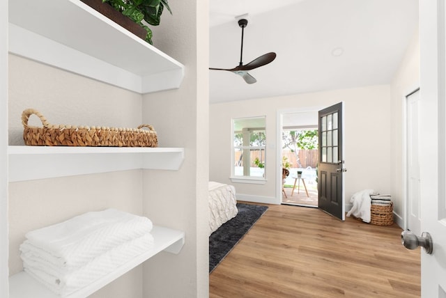 9005 Quail Creek Dr, Austin, TX 78758 - entryway with wood finished floors, ceiling fan, and lofted ceiling