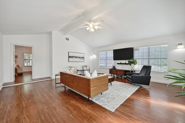 4607 S Forest Dr, Austin, TX 78745 - living room featuring a ceiling fan, wood finished floors, plenty of natural light, and baseboards
