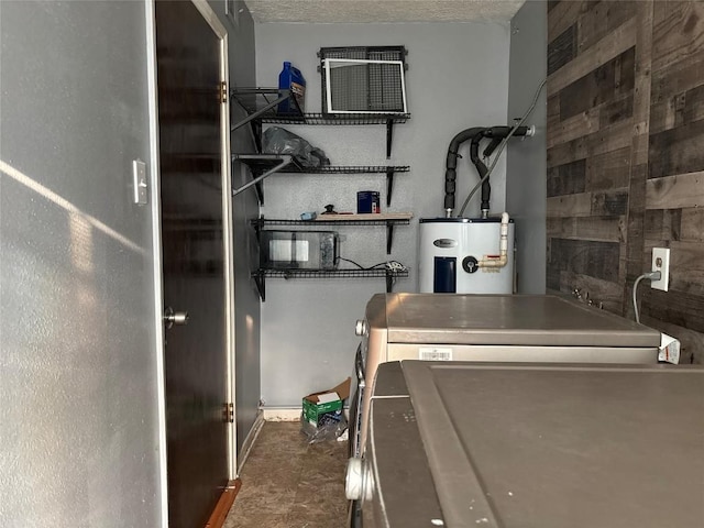 utilities featuring water heater and separate washer and dryer