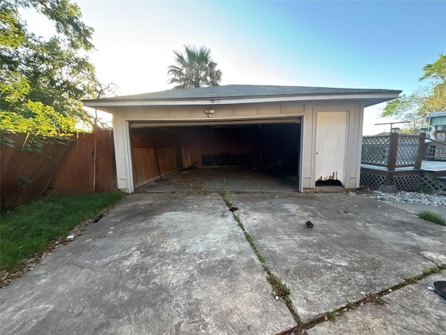 garage with fence