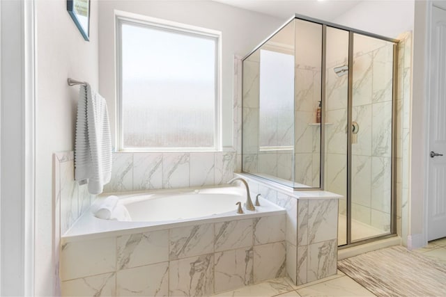 2348 Centennial Loop, Round Rock, TX 78665 - bathroom with a stall shower, marble finish floors, and a bath