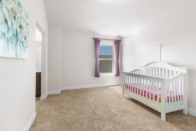 2348 Centennial Loop, Round Rock, TX 78665 - carpeted bedroom with baseboards and a nursery area