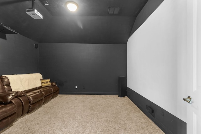 2348 Centennial Loop, Round Rock, TX 78665 - carpeted home theater room with lofted ceiling and baseboards