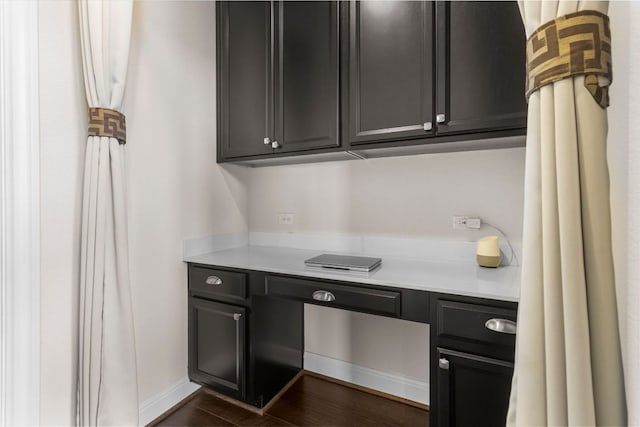 2348 Centennial Loop, Round Rock, TX 78665 - unfurnished office with dark wood finished floors and baseboards