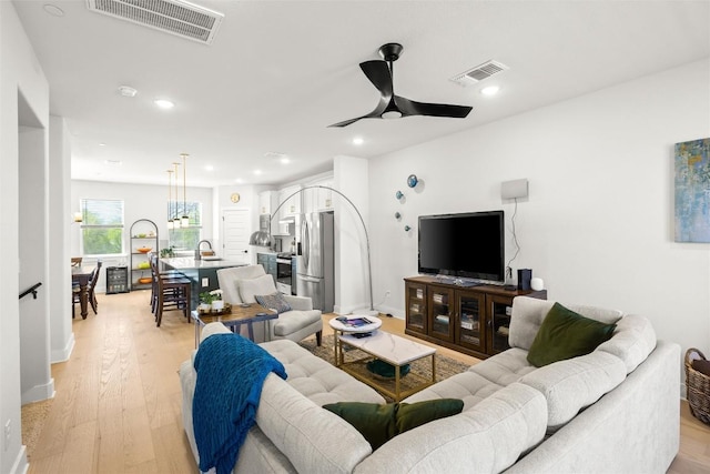 200 W 56th St Unit 4102, Austin, TX 78751 - living area featuring ceiling fan, light wood finished floors, and recessed lighting