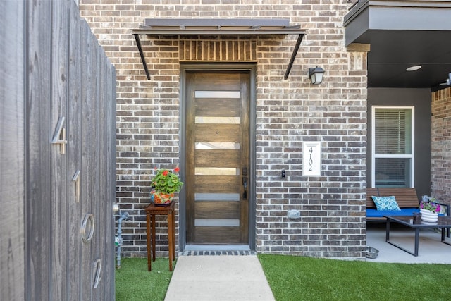 200 W 56th St Unit 4102, Austin, TX 78751 - view of exterior entry with brick siding